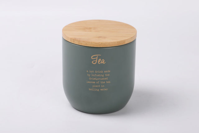 Rockingham Metal Tea Tin in gray and green with gold accents, features bamboo lid and rubber seal for freshness.