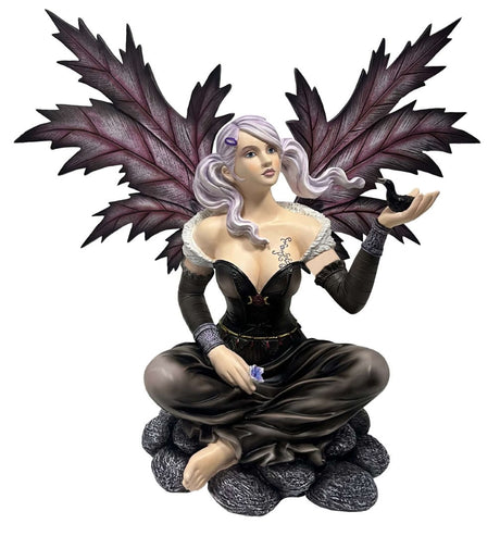 Resin fairy ornament holding a black pigeon, perfect for whimsical decor and enhancing your home or garden.