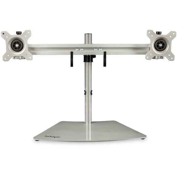 Sleek silver dual-monitor stand for 12-24" VESA screens, maximizing desk space while providing adjustable height and tilt.