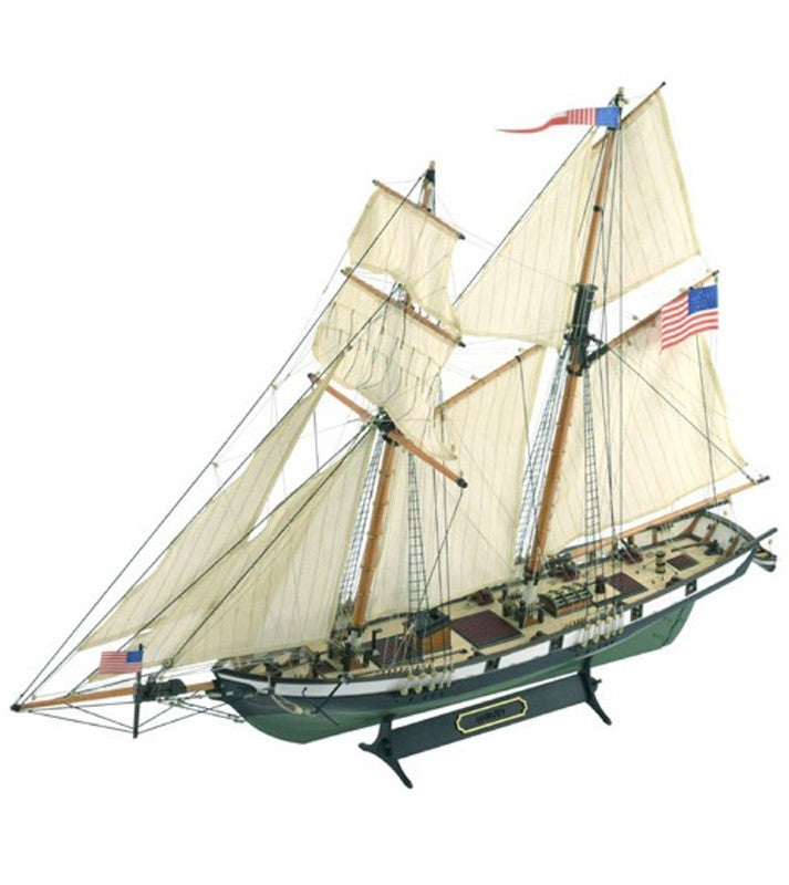 Detailed 1:60 scale wooden model of the American schooner Harvey with intricate fittings and eight cannons.