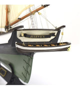 Meticulously crafted 1:60 scale model of the American schooner Harvey with eight cannons, ideal for hobbyists.