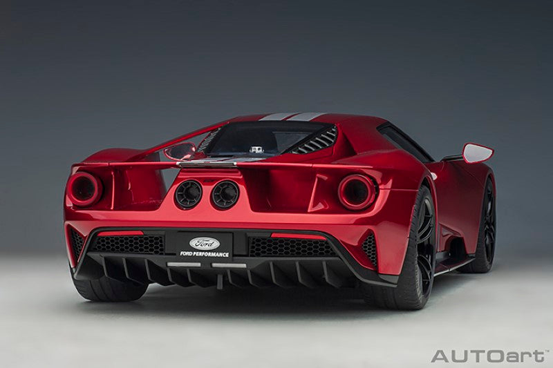 1/12 scale diecast Ford GT in vibrant Liquid Red with sleek Silver Stripes, perfect for collectors and display.