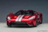 1/12 scale diecast Ford GT in Liquid Red with Silver Stripes, showcasing exquisite detail and design for collectors and enthusiasts.