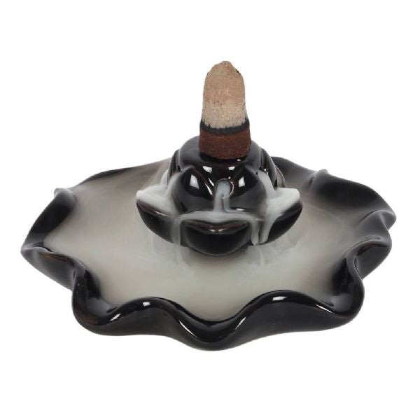 Black ceramic lotus pool backflow burner with cascading smoke effect; height 5 cm, width and depth 11.5 cm.