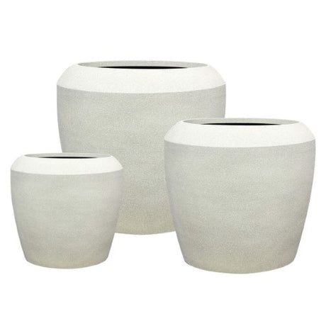 Set of 3 chic chalk beige planters, crafted from durable stone mix, perfect for elevating modern indoor and outdoor gardens.