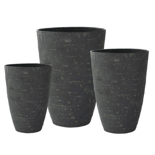 Set of three elegant ash stone planters, durable yet lightweight, perfect for enhancing outdoor spaces with style.