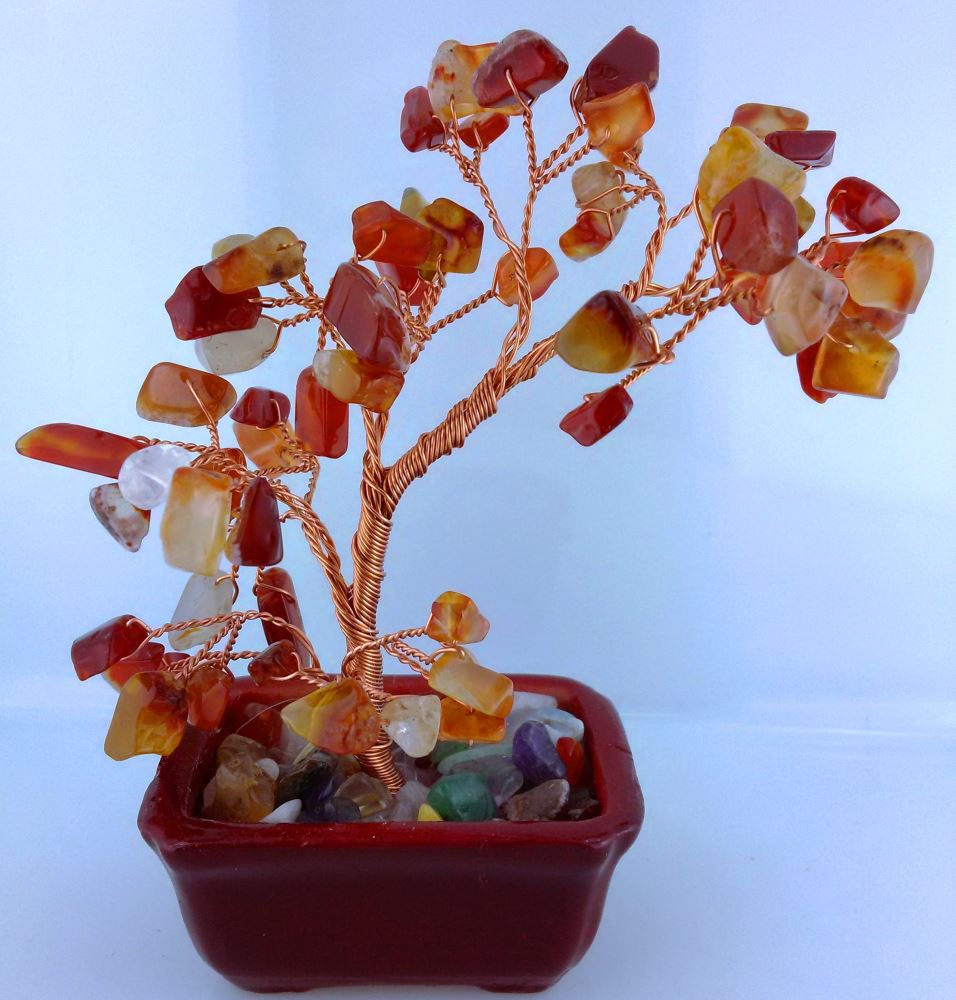 Small Carnelian gemstone tree standing 15cm tall with assorted gemstones, promoting positive energy and vibrant decor.