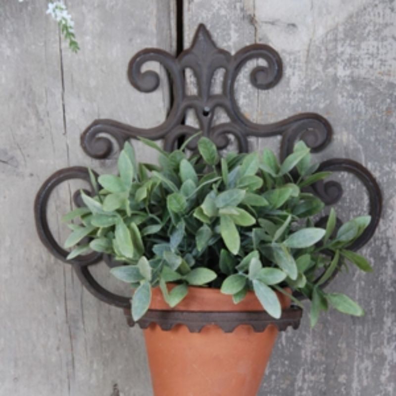 Elegant cast iron flowerpot holder (29.8 x 31.7cm) for stylishly displaying various plants and flowers indoors or outdoors.