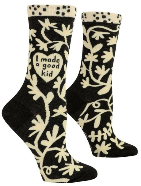 Blue Q Socks featuring "I Made A Good Kid" message, cozy and colorful for women sizes 5-10, perfect for proud parents.