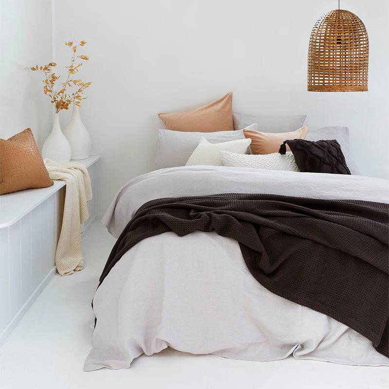 Charcoal waffle weave blanket made from 100% cotton, perfect for all seasons, measuring 240 x 180 cm for versatile use.