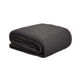 Charcoal waffle weave blanket in 100% cotton, 240x180cm, lightweight, breathable, perfect for year-round comfort and style.