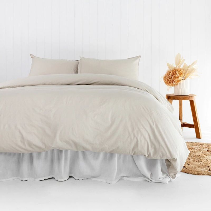 Super King duvet cover set in pebble organic cotton, featuring soft vintage-washed fabric and delicate twin needle stitching.