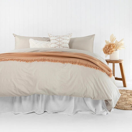 Super King duvet cover set made of vintage-washed organic cotton in pebble color, includes quilt cover and two pillowcases.