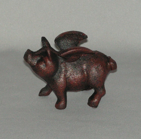 Whimsical 10x8cm Flying Pig Ornament, symbolizing luck and creativity for home or office decor.