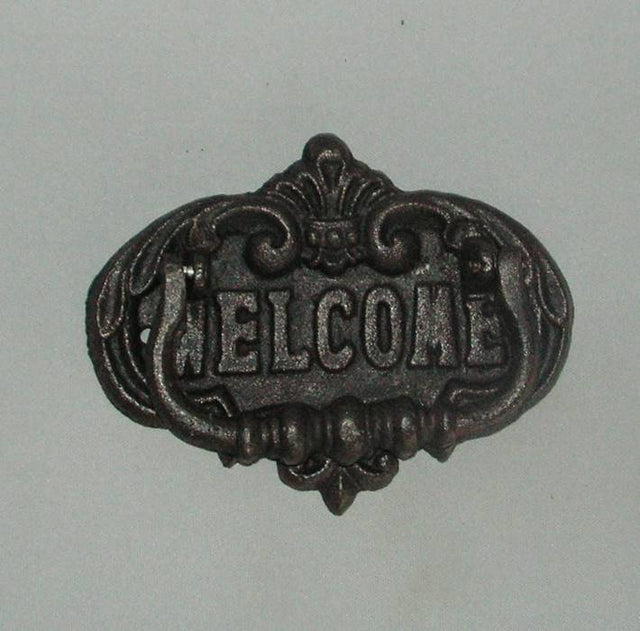 Iron door knocker with 'Welcome' design, measuring 17cm x 14cm, combines style and durability for any entrance.
