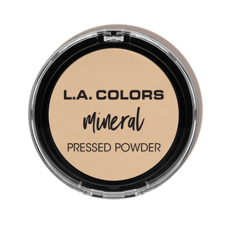 LA Colors Mineral Pressed Powder in Light Ivory offers lightweight, breathable coverage with a velvety finish for all skin types.