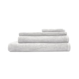 Set of six 33x33cm white cotton face washers, soft and durable for daily cleansing and suited for any bathroom decor.