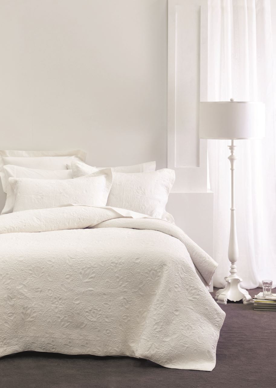 Elegant white Chantel Bedspread for queen-size beds, featuring premium cotton, intricate quilting, and two matching pillowcases.