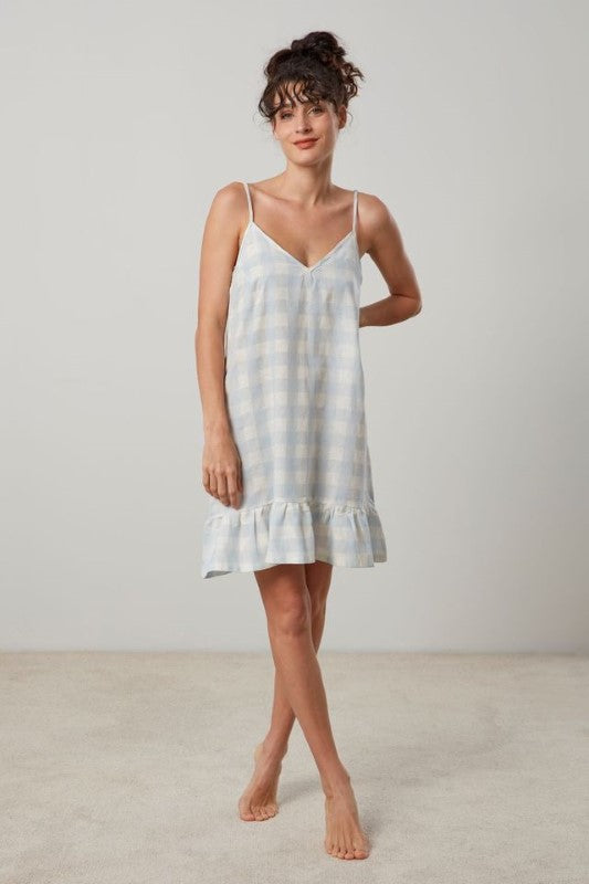 Blue and white checked nightie with adjustable straps, frilled hem, and 'v' neck, made from breathable cotton-linen blend.