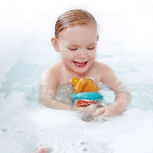 Hape Swimmer Teddy, a wind-up bath toy for toddlers, engages kids with fun swimming action during bath time.