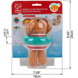 Wind-up bath toy featuring a cute teddy bear that swims, perfect for engaging toddlers during bath time play.