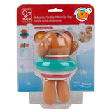 Wind-up Hape Swimmer Teddy bath toy, perfect for toddlers, glides through water for fun and imaginative play.