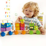 Colorful wooden train set with uniquely shaped blocks, promoting creativity and fine motor skills for toddlers aged 18 months and up.