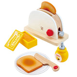 Wooden Pop-Up Toaster Set for kids, perfect for imaginative breakfast play, designed for ages 24 months and up.