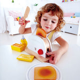 Colorful wooden Pop-Up Toaster Set for imaginative play, perfect for kids 24+ months age.