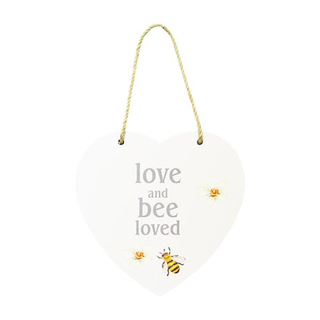 Heart-shaped MDF wall art with twine hanger, featuring "Love, and Bee Loved" inscription, 15 x 15 cm.