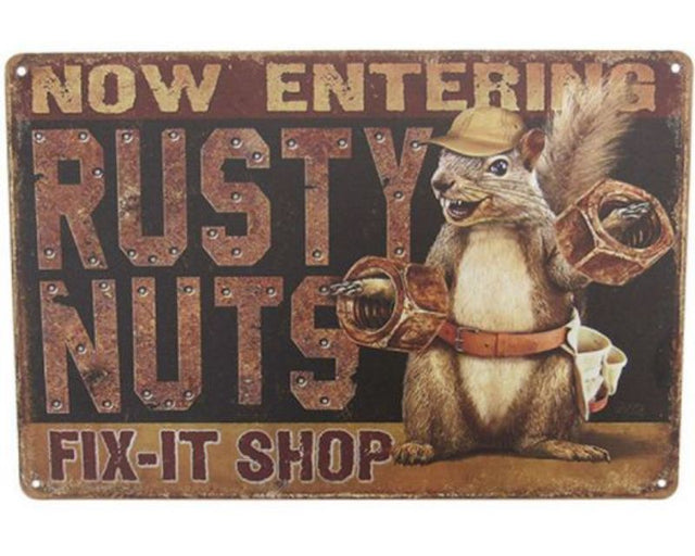 Retro tin sign featuring a quirky rusty nuts design, perfect for home or garage decor, measuring 30cm x 20cm.