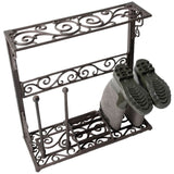 Cast iron boot rack, 34x63x78cm, with middle scraper, 8 poles for 4 pairs of boots, and rubber feet for floor protection.