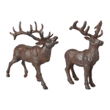 Set of 2 assorted cast iron deer ornaments, showcasing detailed antlers and traditional craftsmanship, measuring 23cm and 17cm tall.