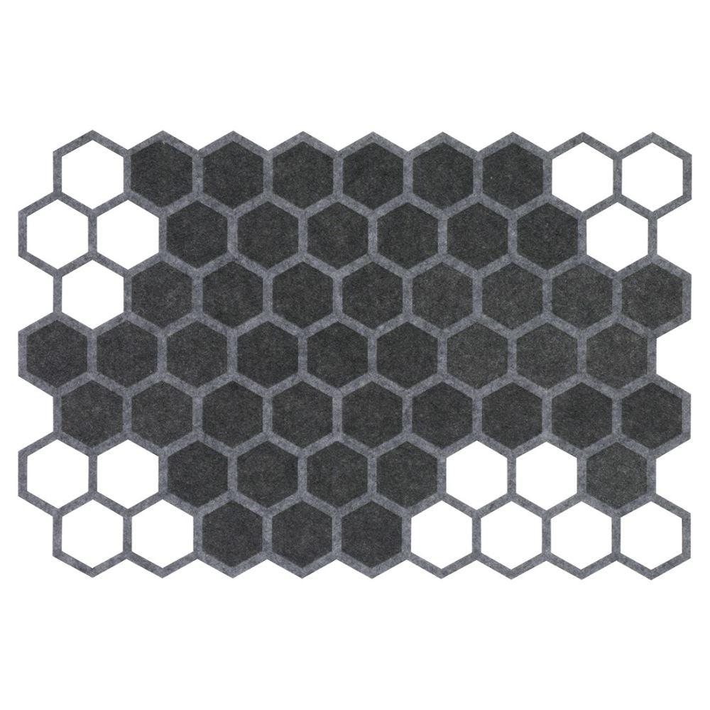 Grey geometric felt placemat featuring a honeycomb design with stylish cut-outs, ideal for enhancing dining decor.