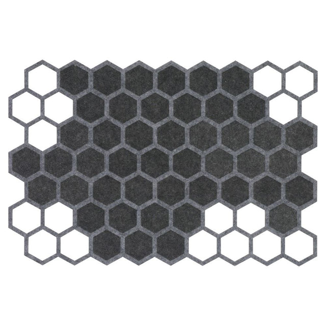 Grey geometric felt placemat featuring a honeycomb design with stylish cut-outs, ideal for enhancing dining decor.