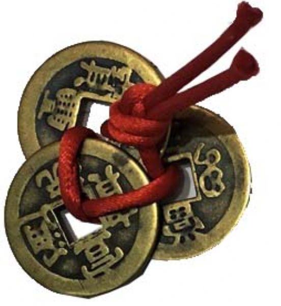 Feng Shui 3 Coin Set in brass, tied with a red ribbon, designed to attract wealth and enhance positive energy.