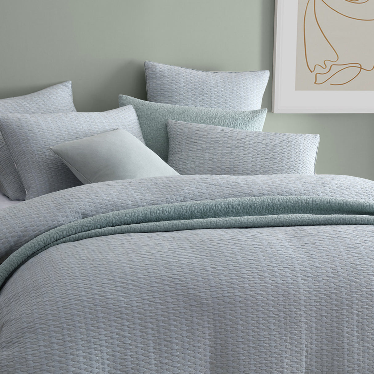 Frankie Sage King Bed Quilt Cover Set features a honeycomb waffle texture, offering timeless style and versatility for your bedroom.