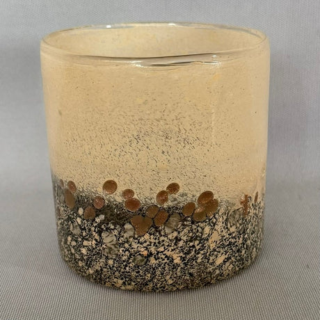 Neutral candle holder measuring 12 x 12cm, perfect for tealights or pillar candles, enhancing any interior decor style.