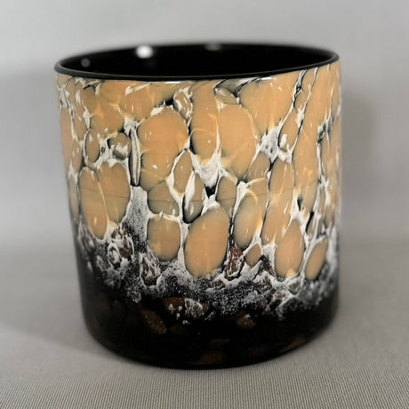 Elegant black candle holder measuring 10 x 10cm, perfect for enhancing home decor and creating a cozy atmosphere.