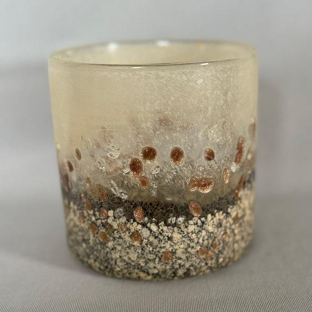 Neutral 10x10cm candle holder, perfect for pillar candles or tealights, enhances decor with minimalist elegance and warmth.