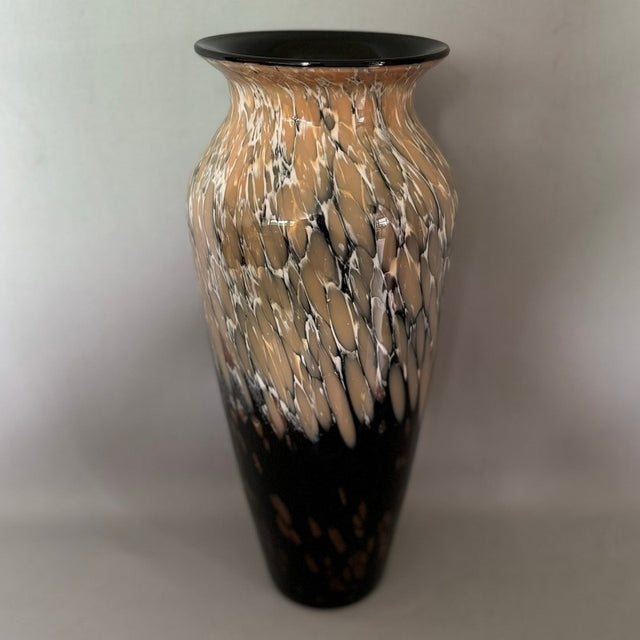 Elegant black vase measuring 16 x 36cm, perfect for home decor and showcasing flowers in any interior style.