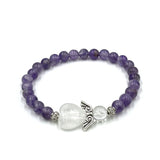 Amethyst crystal heart bracelet with guardian angel charm, promoting healing, balance, and emotional support.