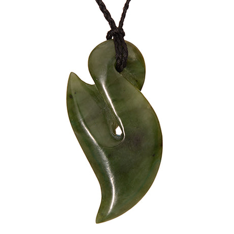 Greenstone Twist Pendant crafted from Nephrite Jade, symbolizing life’s journey and bonds, on an adjustable black wax cord.