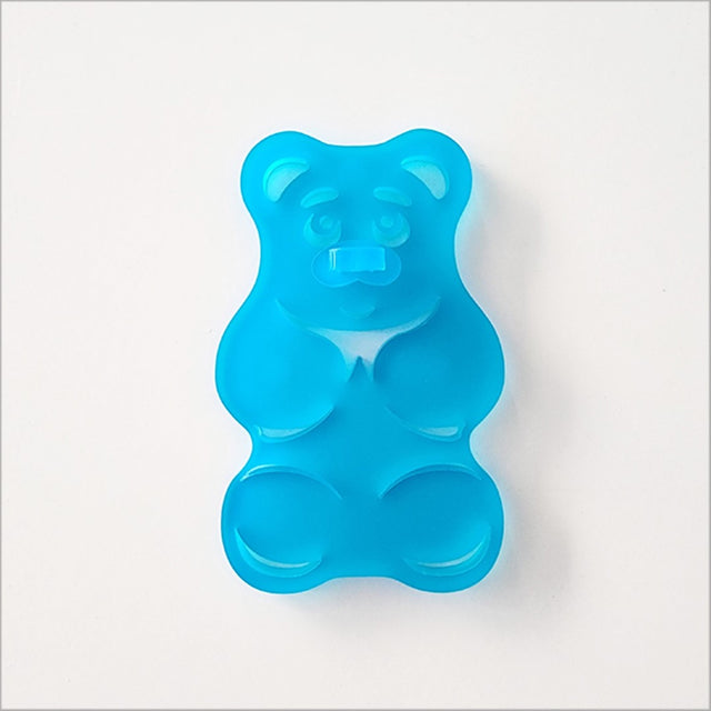 Teal satin acrylic Gummy Bear artwork, 6mm thick, combines playful charm with modern decor for any space.