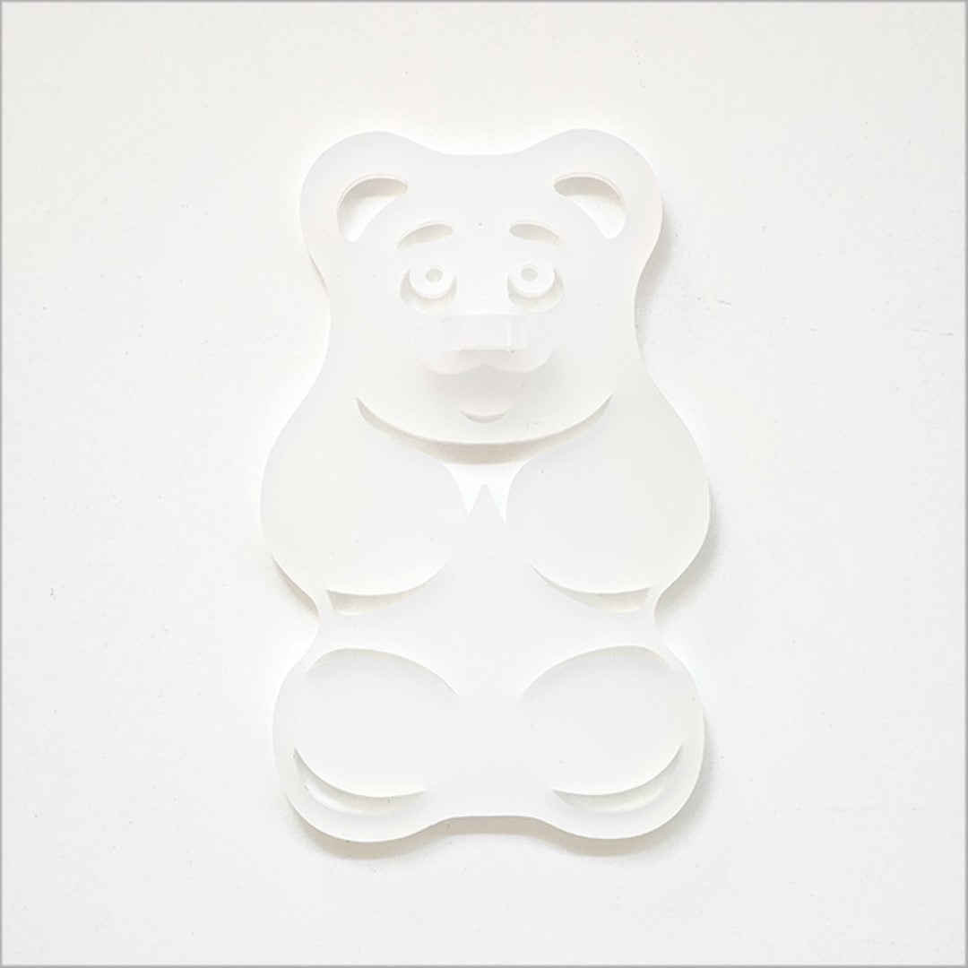 A white satin acrylic gummy bear art piece, 88mm x 139mm, playful and durable, ideal for modern decor.