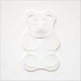 A white satin acrylic gummy bear art piece, 88mm x 139mm, playful and durable, ideal for modern decor.