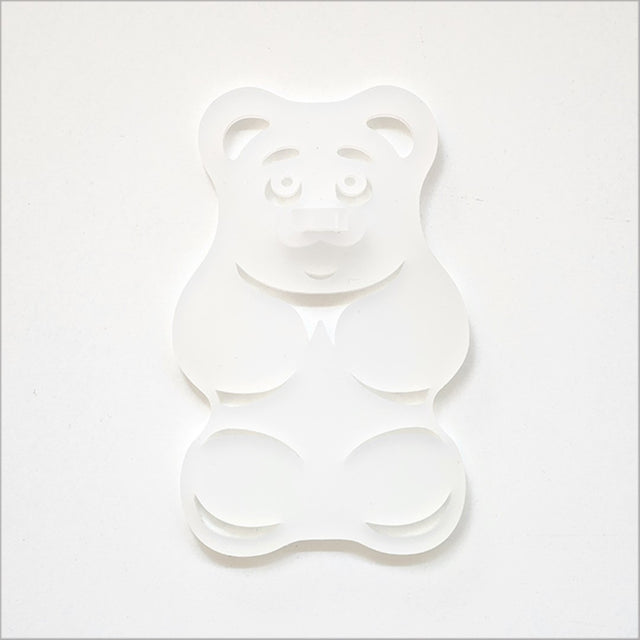 A white satin acrylic gummy bear art piece, 88mm x 139mm, playful and durable, ideal for modern decor.