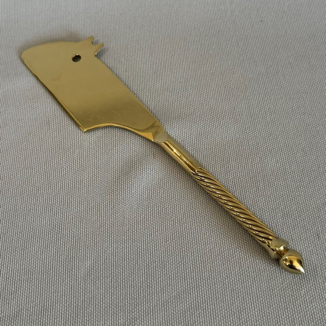 Elegant 20cm cheese knife with a charming brass mouse design and durable stainless steel blade for easy slicing.