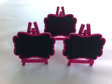 Bright hot pink mini easel blackboards, pack of 3, perfect for event decor, signage, and personalized messages.