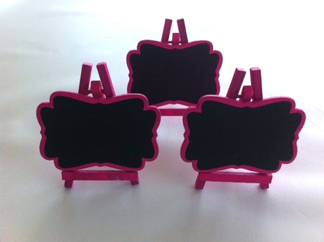 Bright hot pink mini easel blackboards, pack of 3, perfect for event decor, signage, and personalized messages.